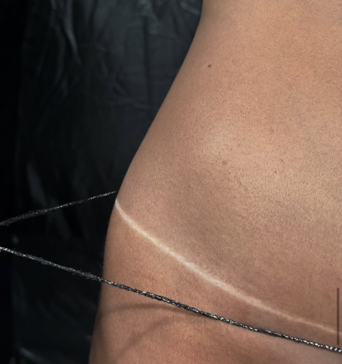 Close-up of bronzed spray tan result